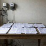 Fachada da Câmara Legislativa do DF representando regras sobre dívidas de água e luz